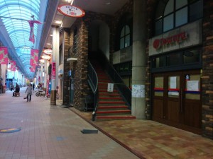 a buidling damaged by the earthquake in a shopping street in Yatsushiro